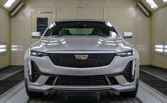 Aluminum Body Repair cadillac in paintbooth
