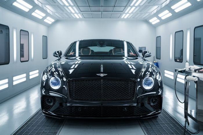 Black-Bentley-in-paint-booth-for-Ceritified-Collision-Repair-Ultimate-Paint-Shop