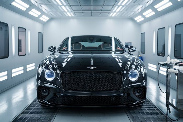 Black-Bentley-in-paint-booth-for-Ceritified-Collision-Repair-Ultimate-Paint-Shop
