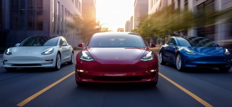 Electric Vehicle Repair 3 teslas driving