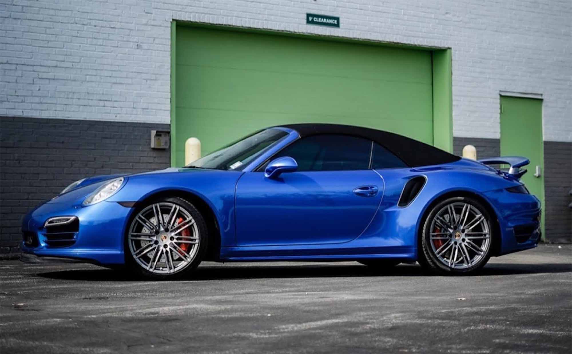 Porsche auto body shop - Blue Convertible Porsche