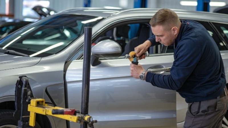 Hail Damage Repair tech