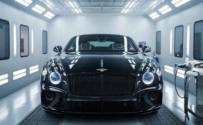 Highland Park Certified Collision Repair bentley in paint booth