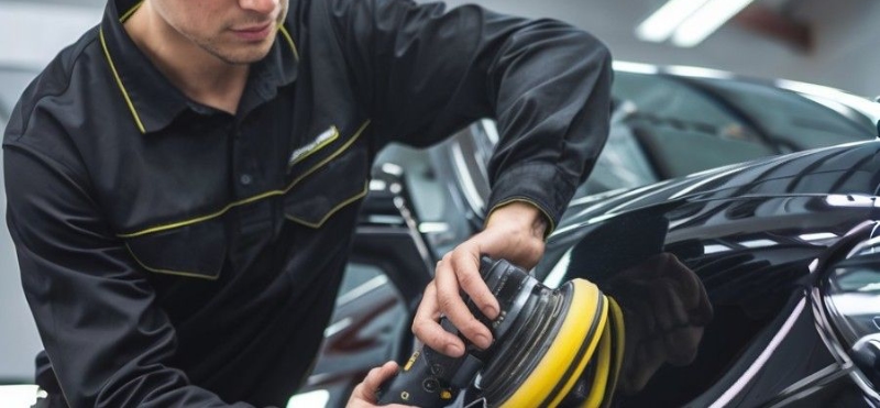 Highland Park Collision Repair tech final polish panel Highland Park Collision Repair tech final polish panel